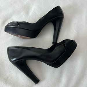 - Stuart Weitzman black heels